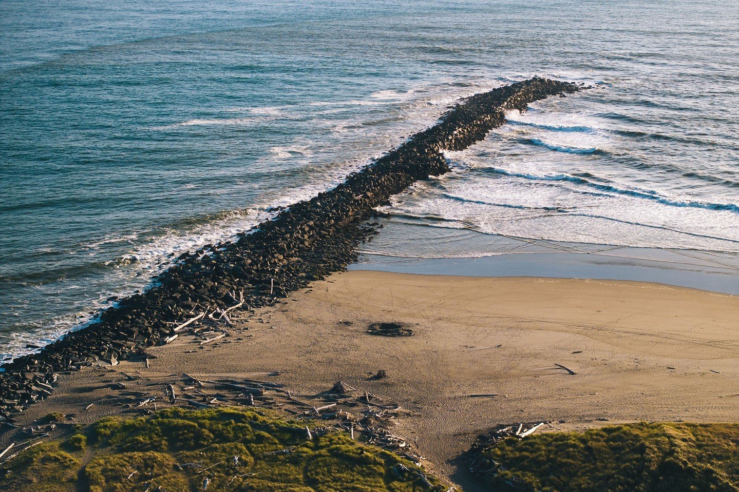 Here is a photo of the North Jetty in Ocean Shores &mdash; but don&rsquo;t let this serene scene fool you! The North Jetty is a storm watcher&rsquo;s paradise. 

🌊 During high tides, storms, and when the ocean is rough, waves will crash and spray ov